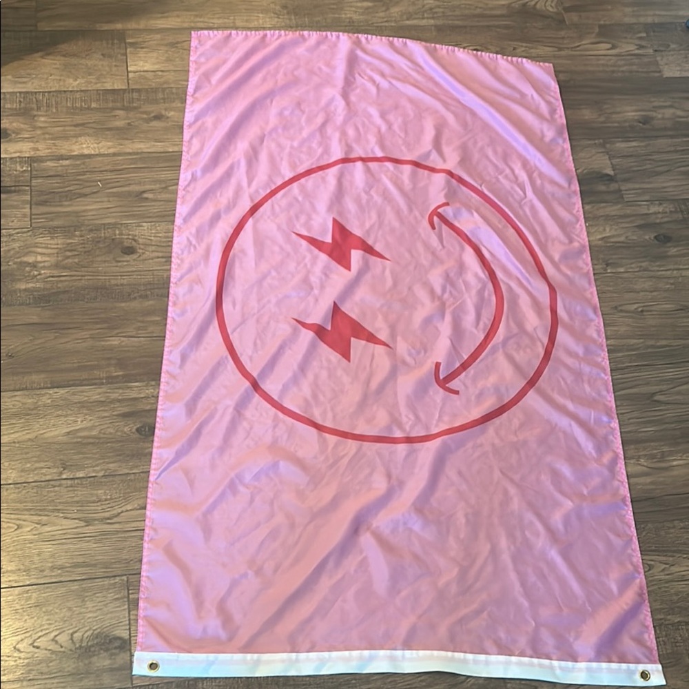 Pink Flag with Red Smiley Face Design